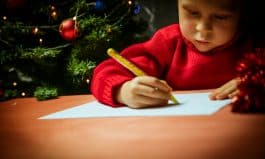 Boy writing letter to Santa