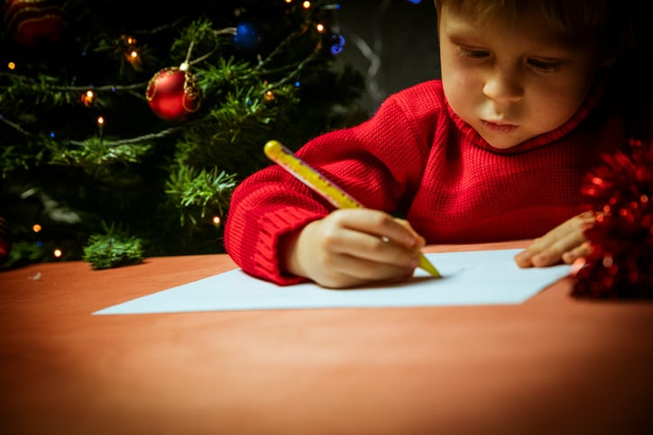 Boy writing letter to Santa