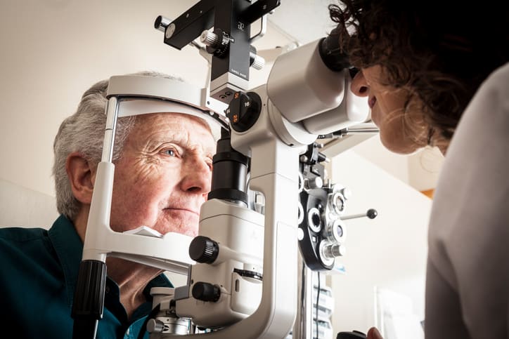 Optometrist with patient