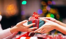 Hands Giving Gift Close