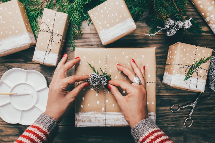 Woman wrapping Christmas presents